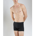 Model stretching in SilkCut Micro Modal Air boxer briefs to show flexible 4-way stretch