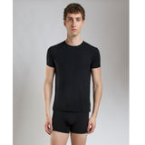 Flat lay of SilkCut Micro Modal Air unisex t-shirt in black and navy showcasing breathable softness